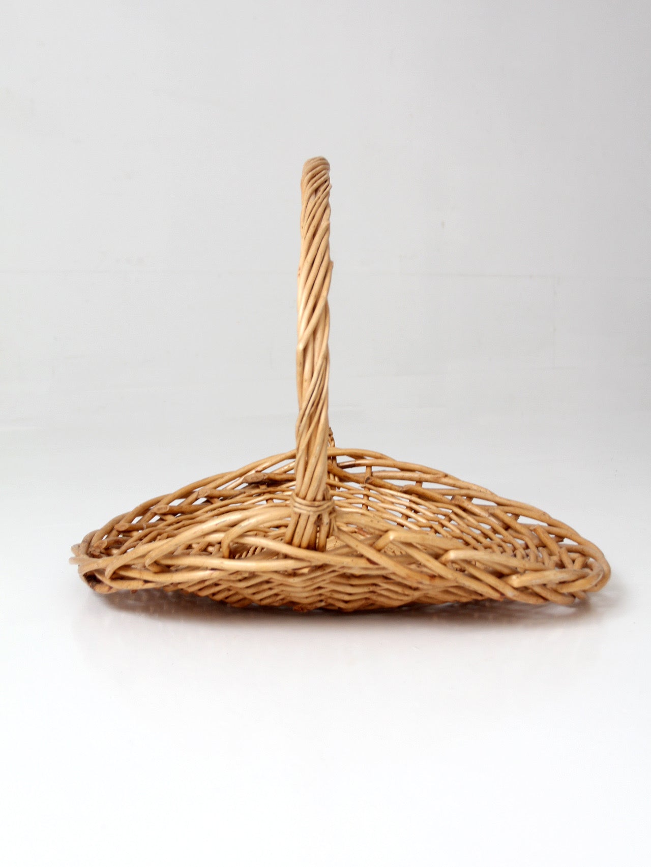 large vintage wicker gathering basket