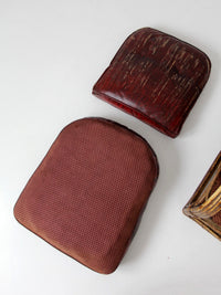 antique rattan lounge chair with oxblood cushions