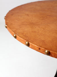 mid-century leather and iron round dining table