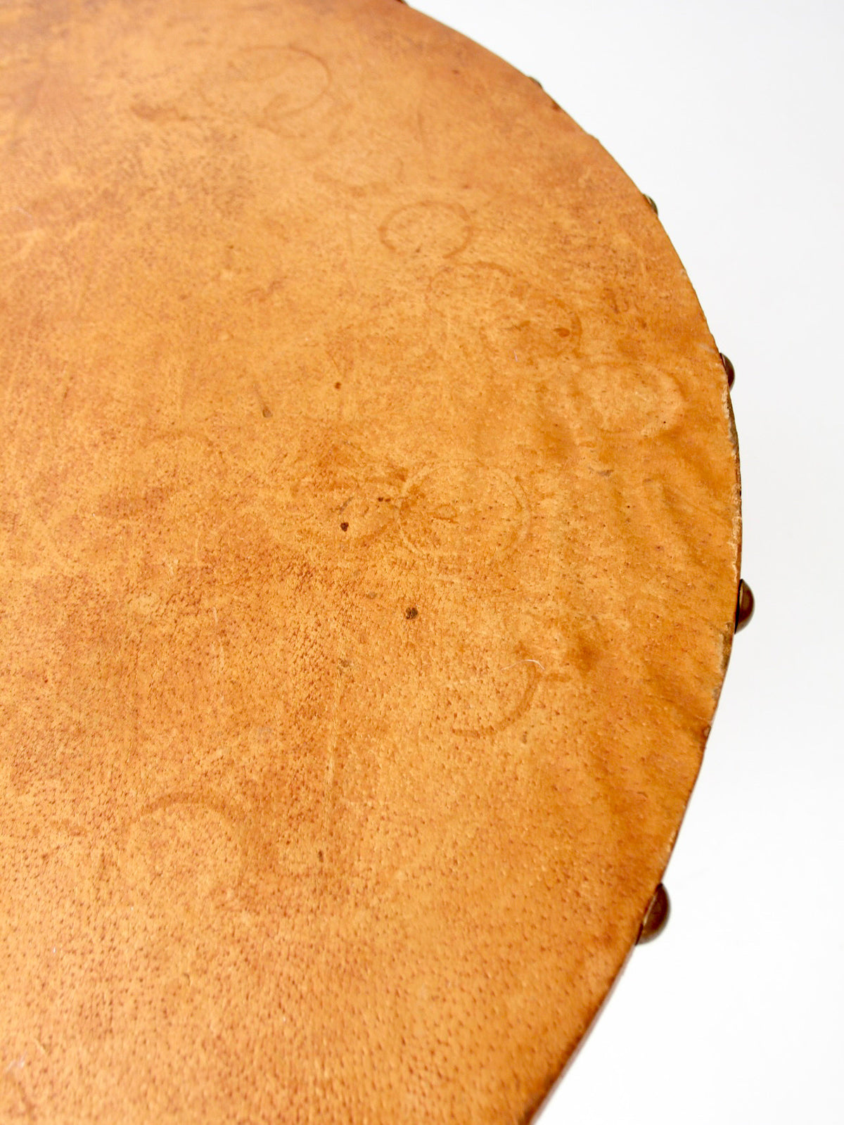 mid-century leather and iron round dining table
