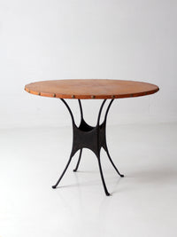 mid-century leather and iron round dining table