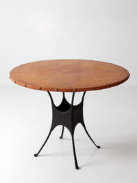 mid-century leather and iron round dining table