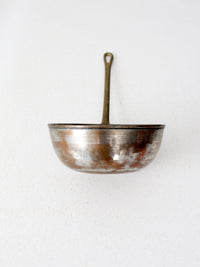 antique copper saucepan with brass handle
