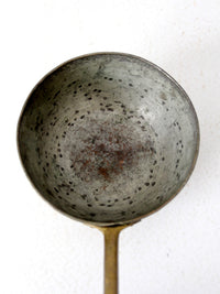 antique copper saucepan with brass handle