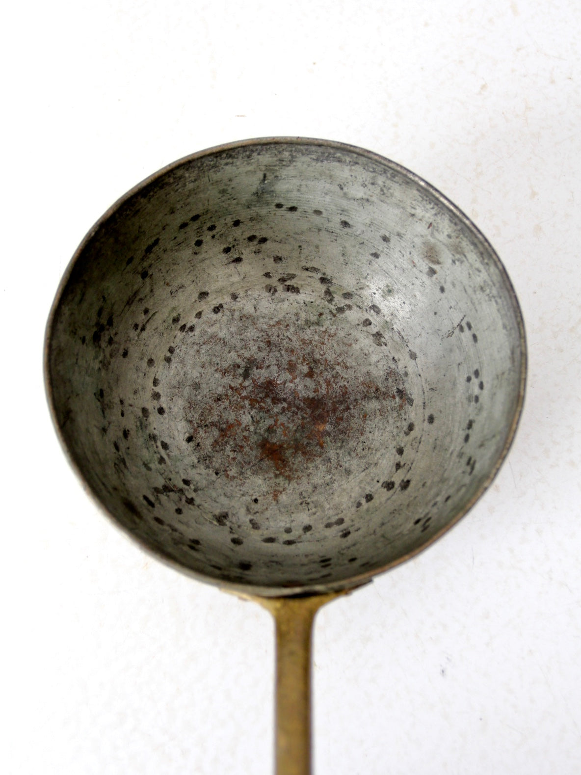 antique copper saucepan with brass handle