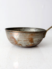 antique copper saucepan with brass handle