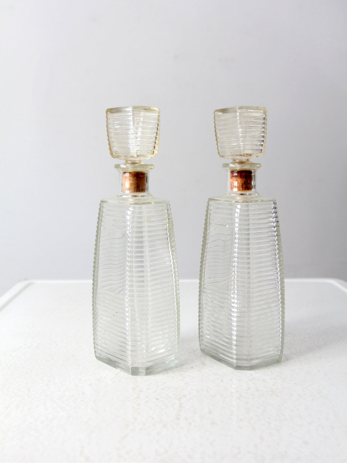 mid century glass liquor decanter bottles pair