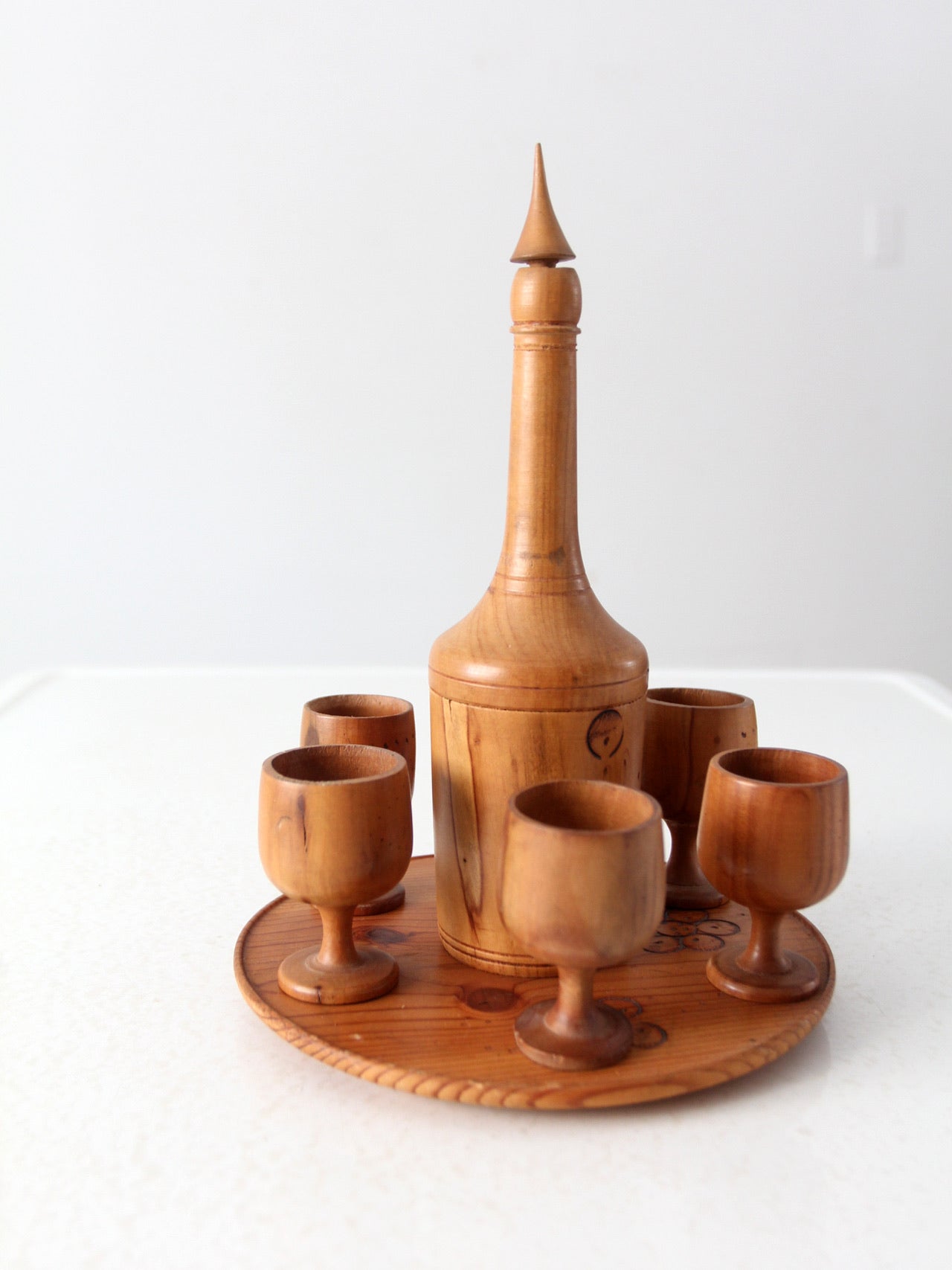 vintage folk art wooden decanter and cup set