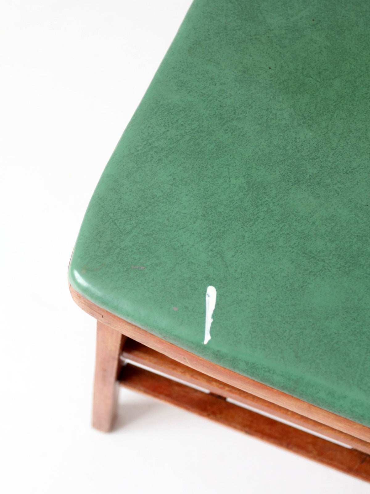 pair of 1950s wooden folding chairs with green seats