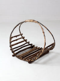 vintage rustic twig basket with arched handle
