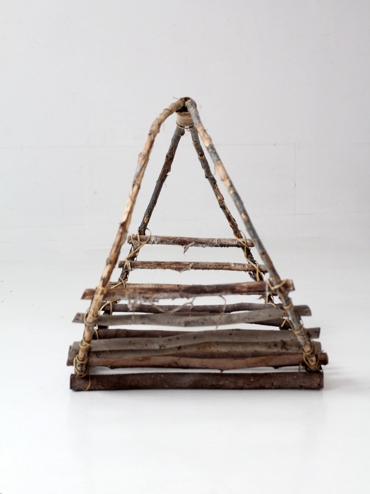 vintage rustic twig basket with arched handle