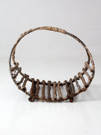 vintage rustic twig basket with arched handle
