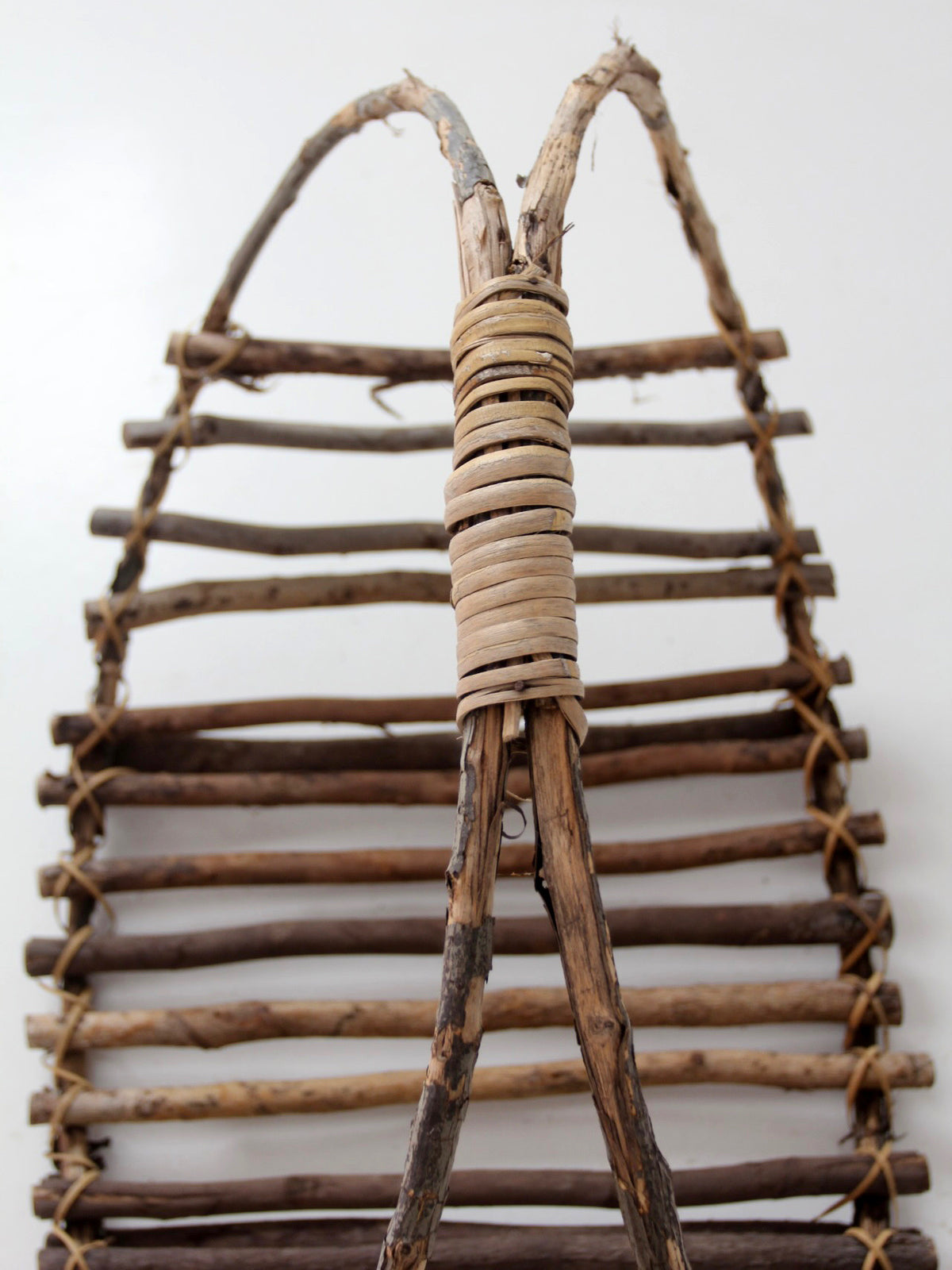 vintage rustic twig basket with arched handle