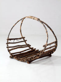 vintage rustic twig basket with arched handle