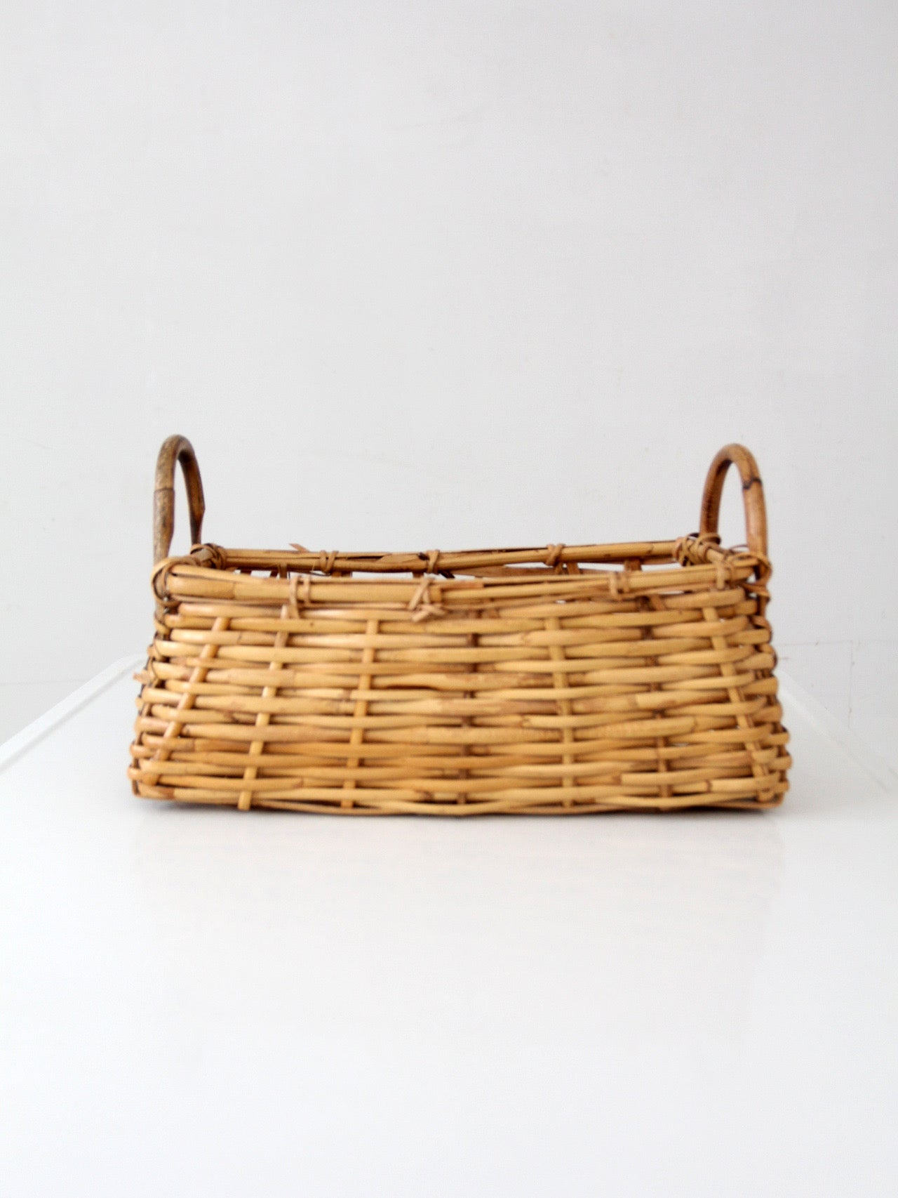 vintage wicker basket with bentwood handles