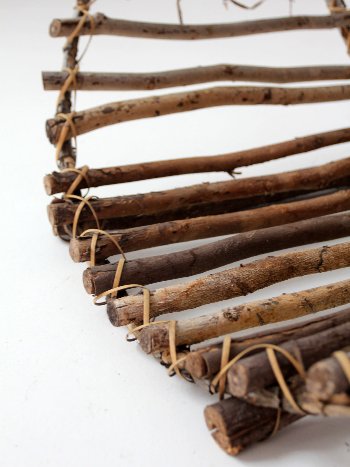 vintage rustic twig basket with arched handle