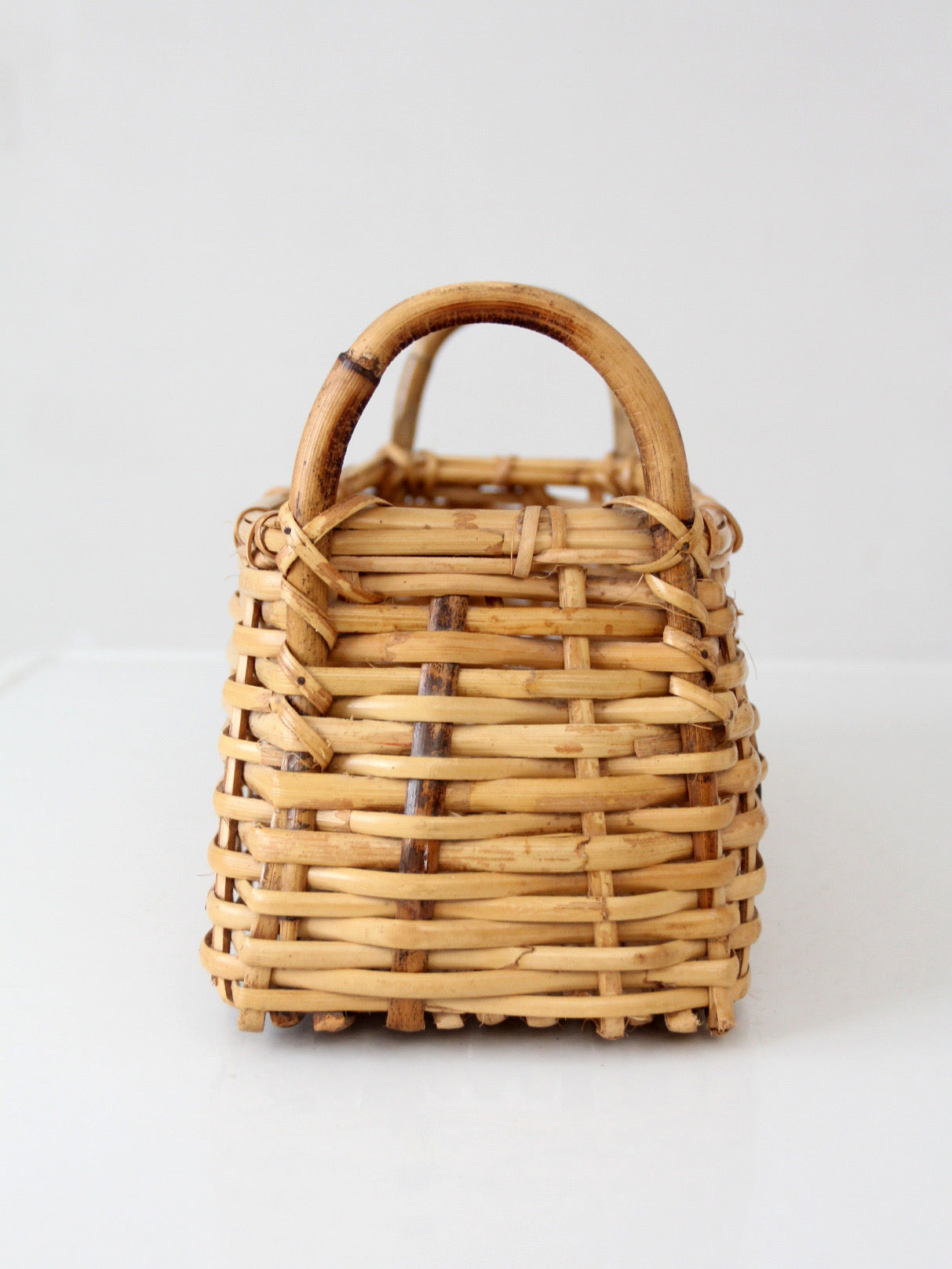 vintage wicker basket with bentwood handles