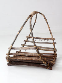 vintage rustic twig basket with arched handle