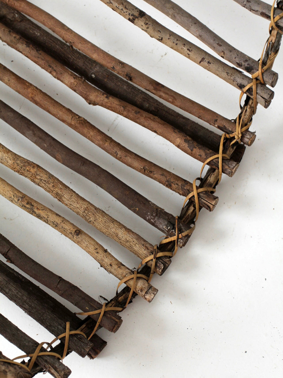vintage rustic twig basket with arched handle