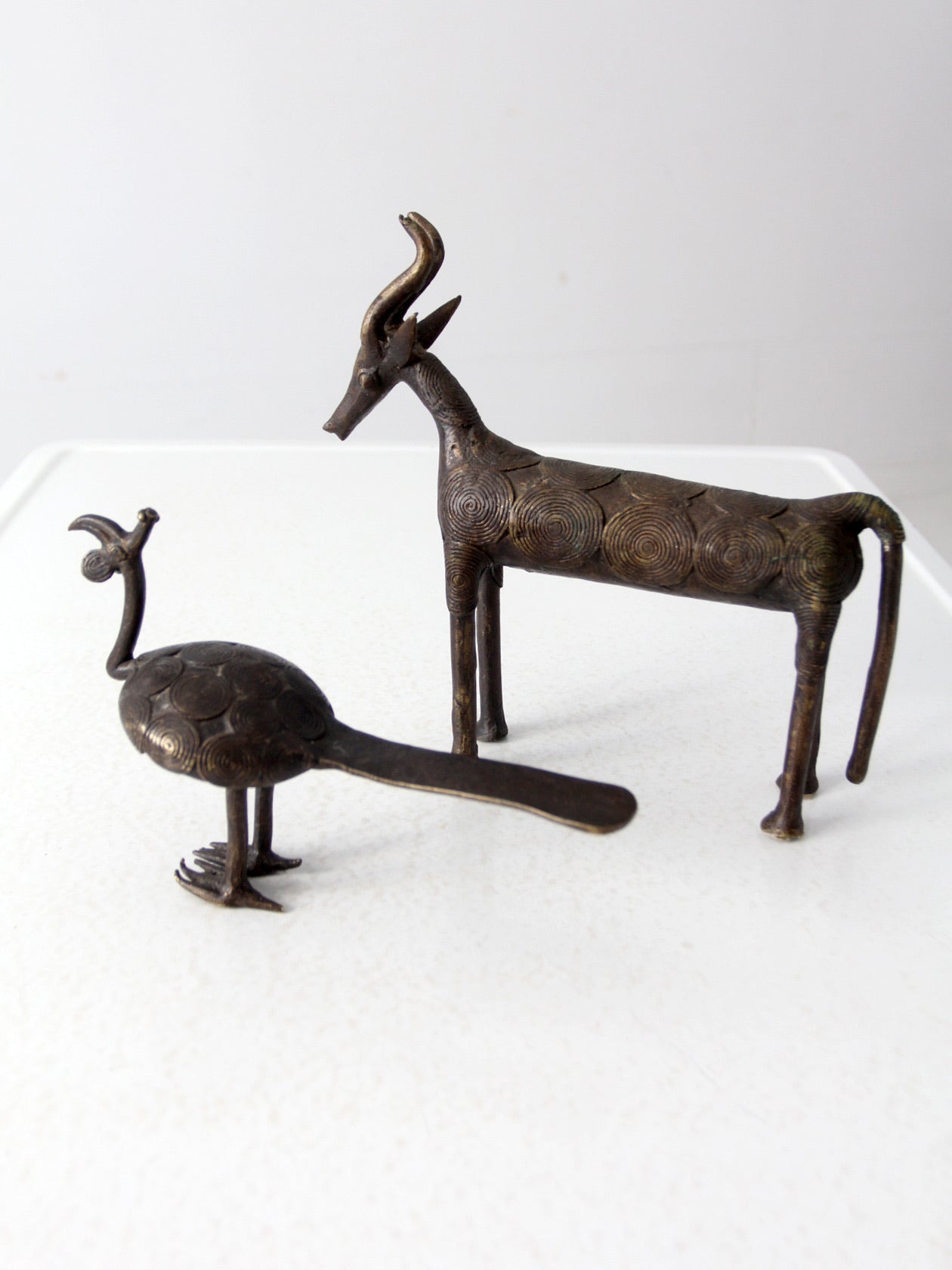 vintage African bronze animal sculptures pair