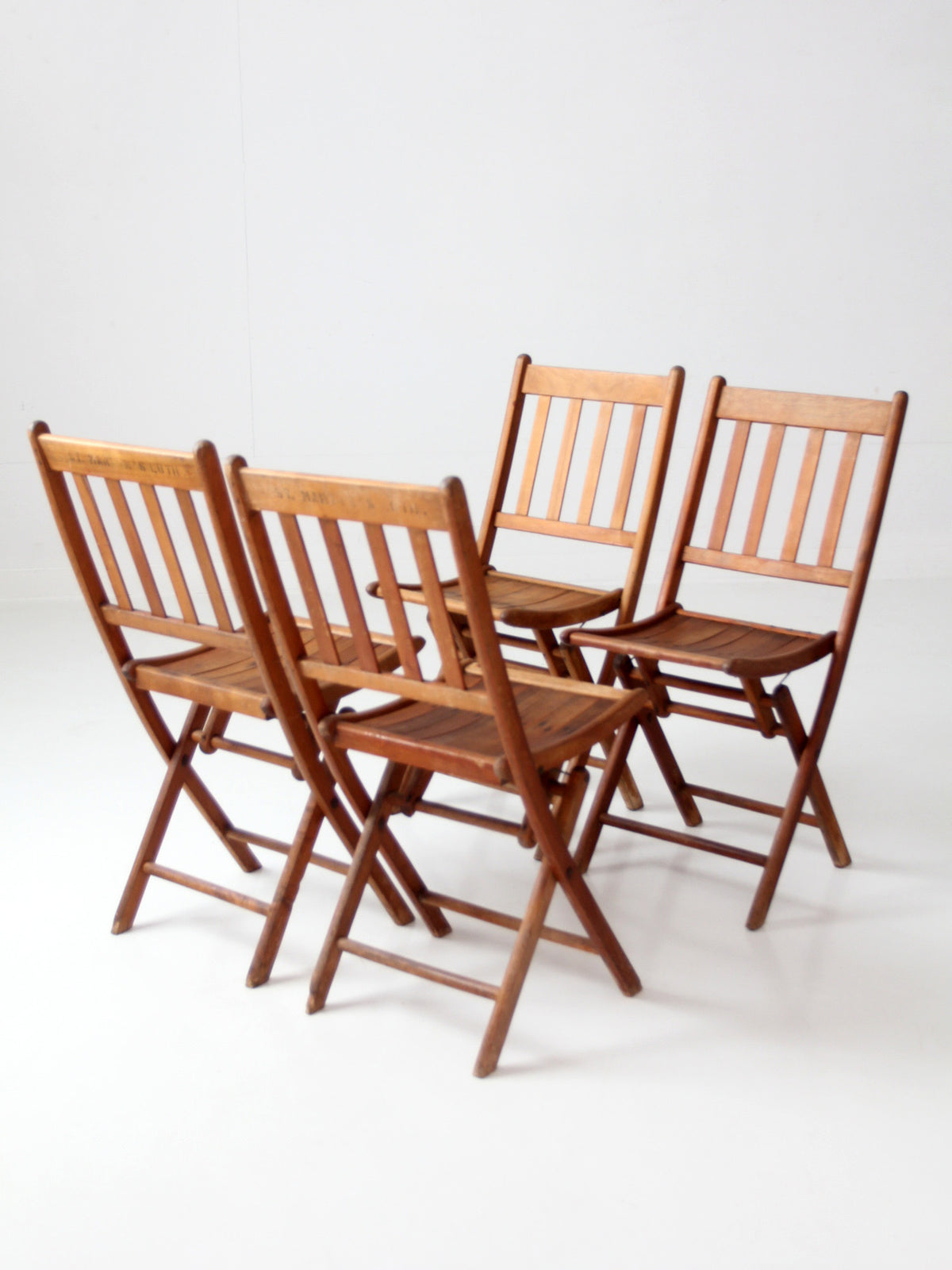 set of 4 antique slat wood folding chairs