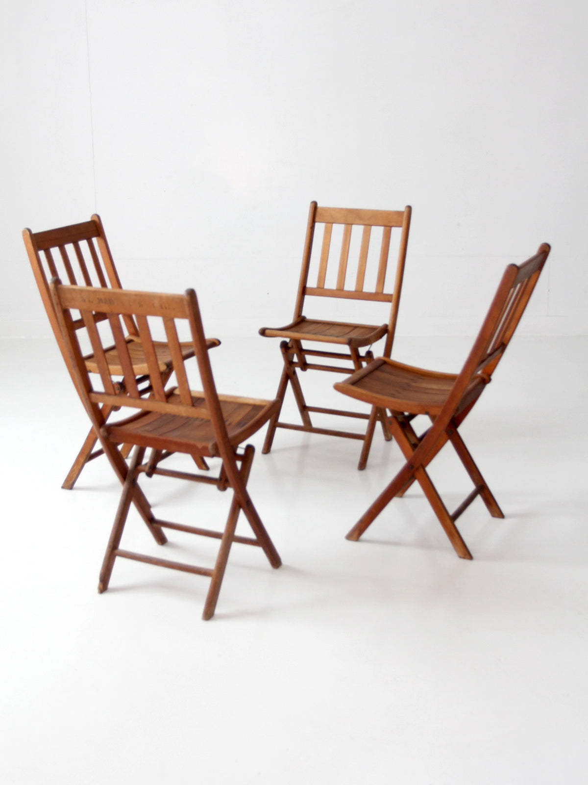 set of 4 antique slat wood folding chairs
