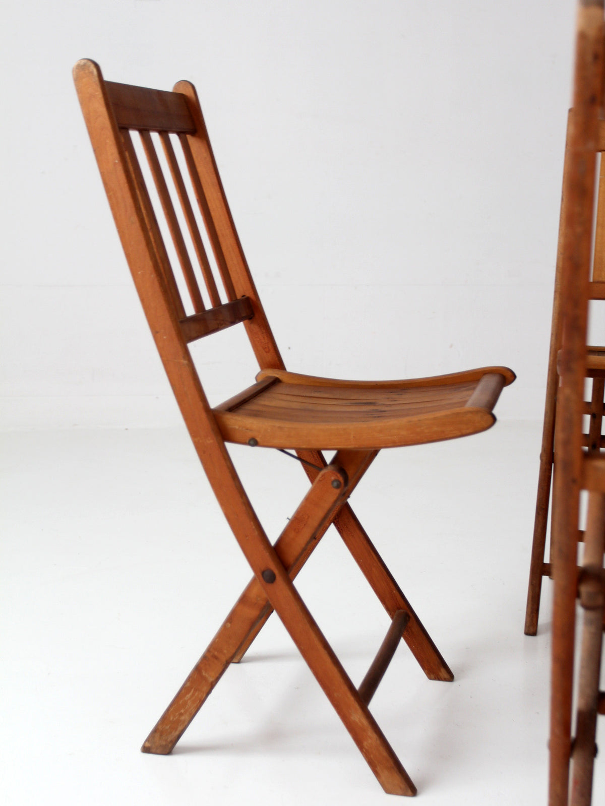 set of 4 antique slat wood folding chairs