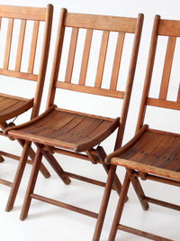 set of 4 antique slat wood folding chairs