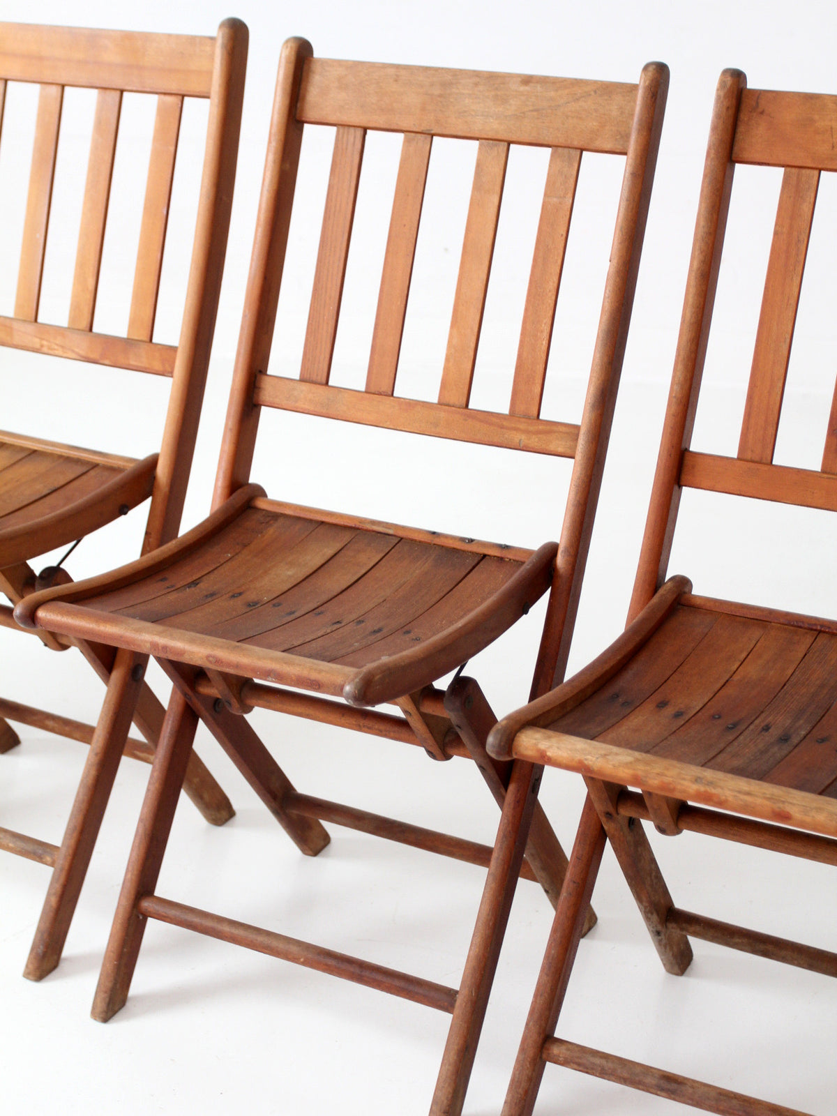 set of 4 antique slat wood folding chairs