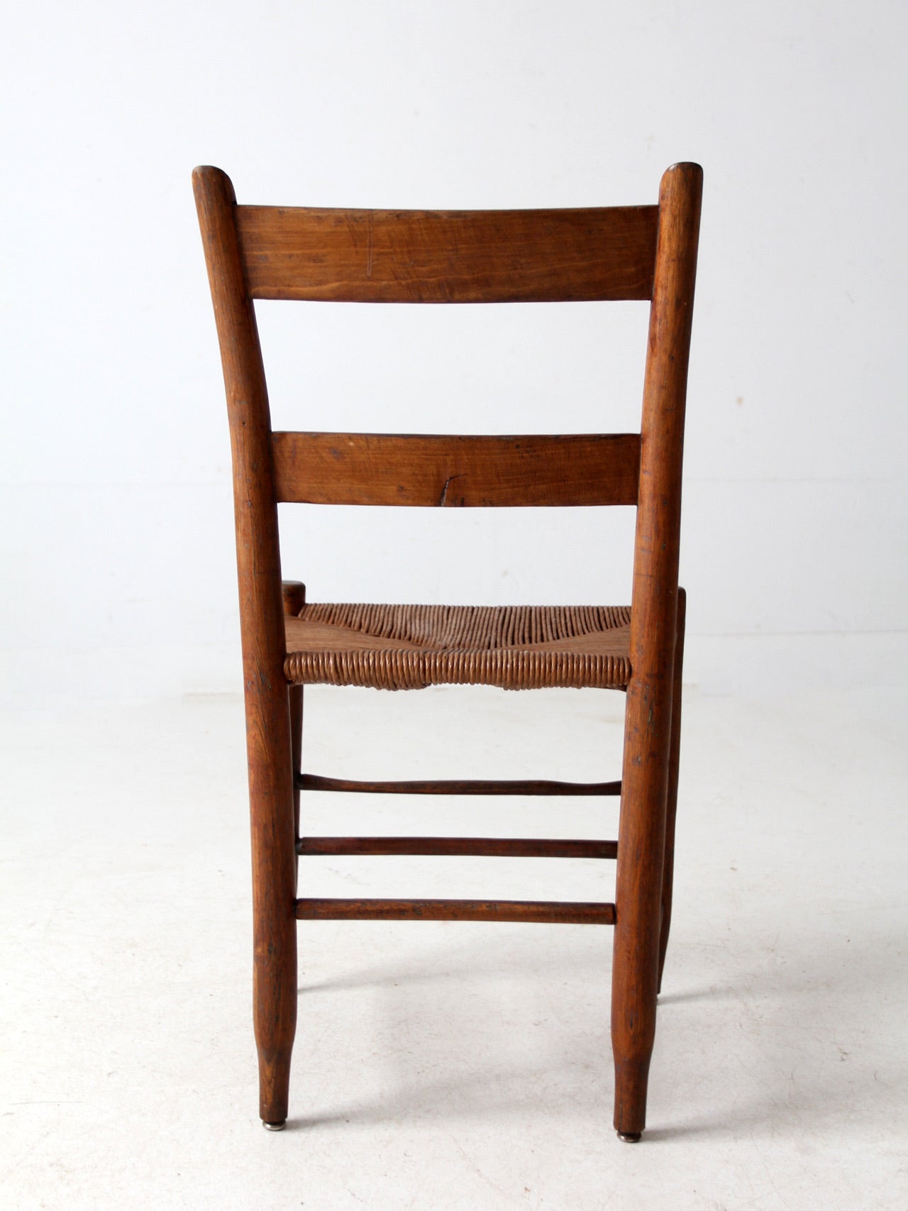 antique ladder back chair with rush seat
