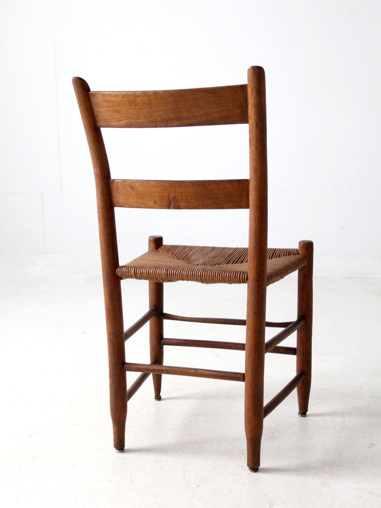 antique ladder back chair with rush seat