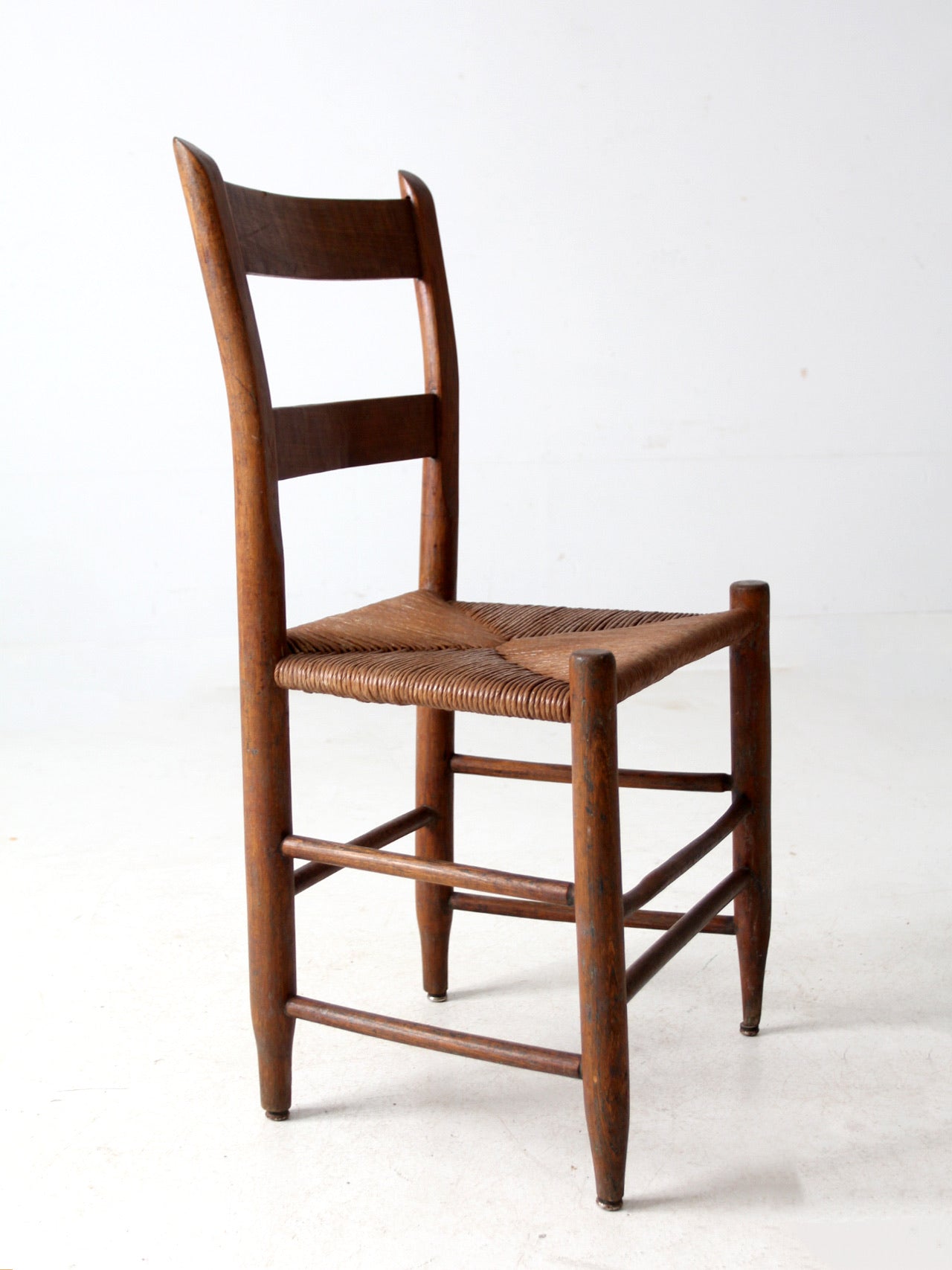 antique ladder back chair with rush seat