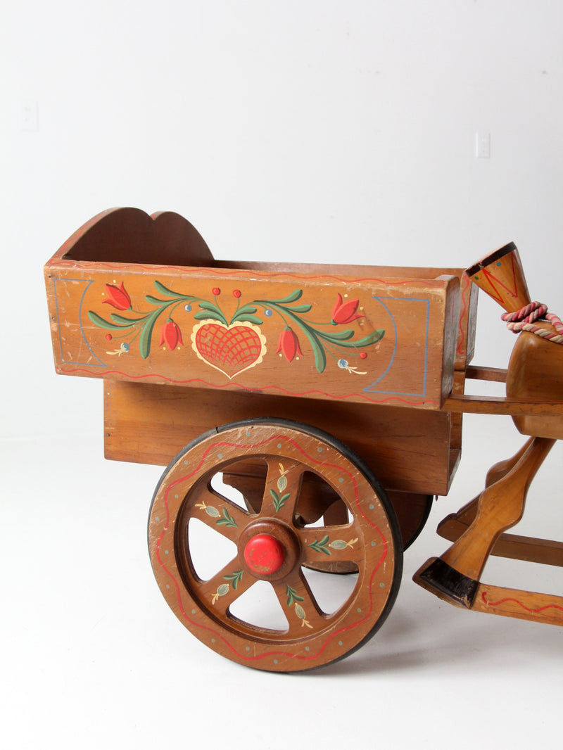 vintage folk art toy riding horse and cart