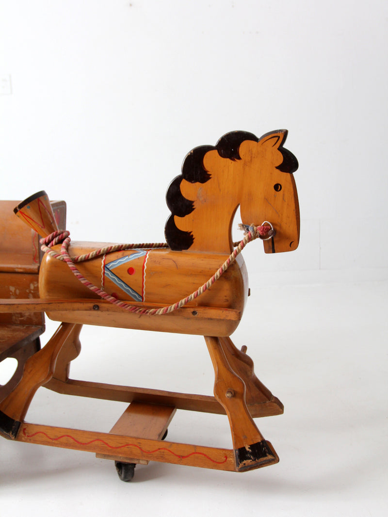 vintage folk art toy riding horse and cart