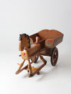 vintage folk art toy riding horse and cart