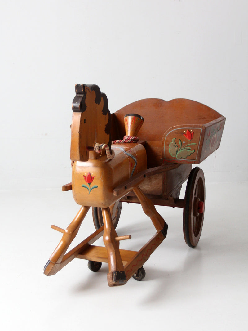 vintage folk art toy riding horse and cart