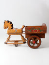 vintage folk art toy riding horse and cart