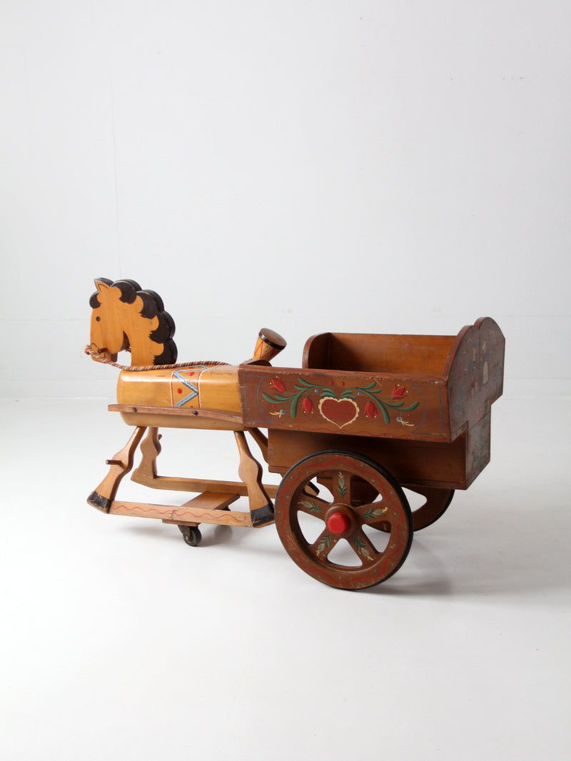 vintage folk art toy riding horse and cart