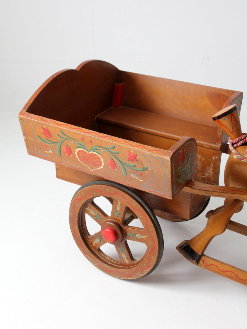 vintage folk art toy riding horse and cart