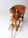 vintage folk art toy riding horse and cart