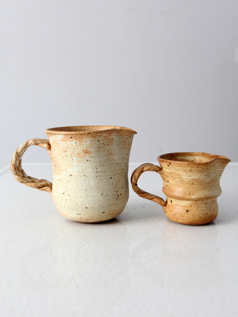 vintage studio pottery pitchers pair