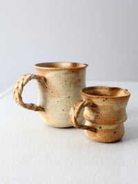 vintage studio pottery pitchers pair