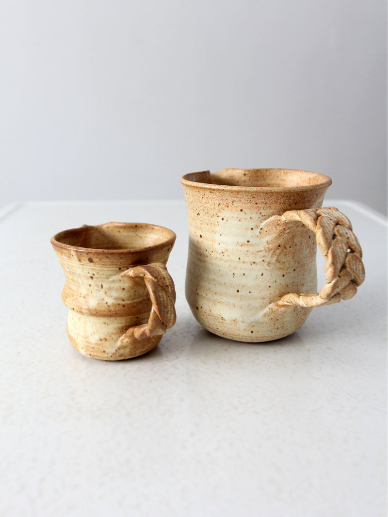 vintage studio pottery pitchers pair