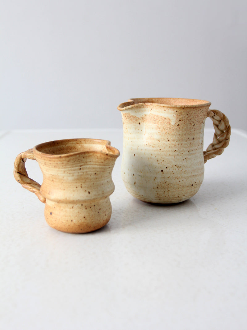 vintage studio pottery pitchers pair