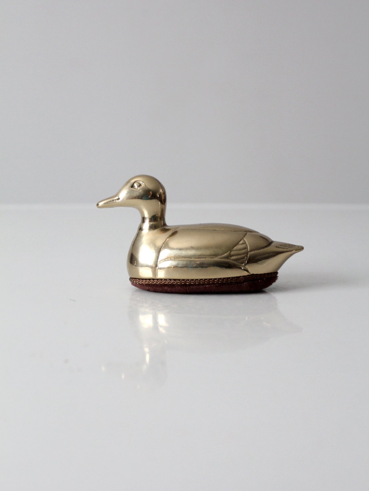 mid-century brass duck lint brush