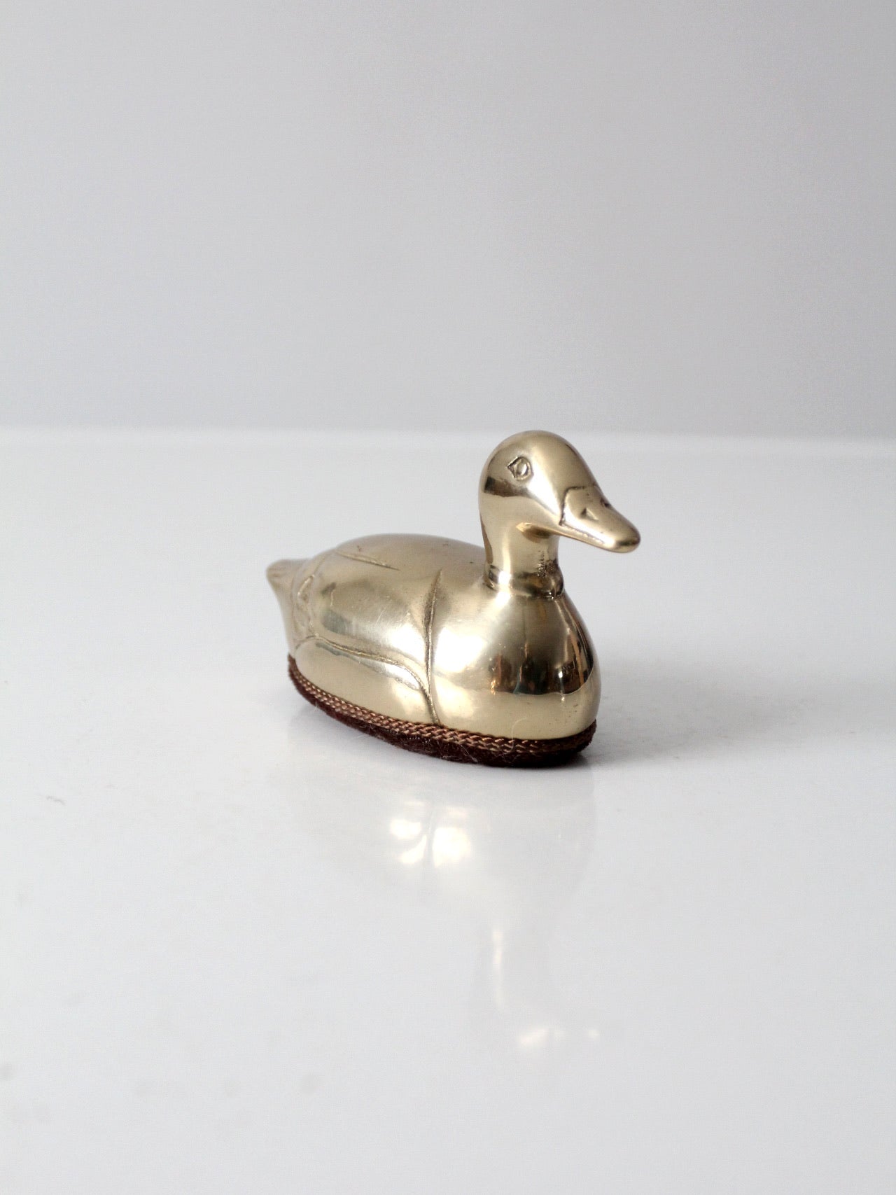 mid-century brass duck lint brush