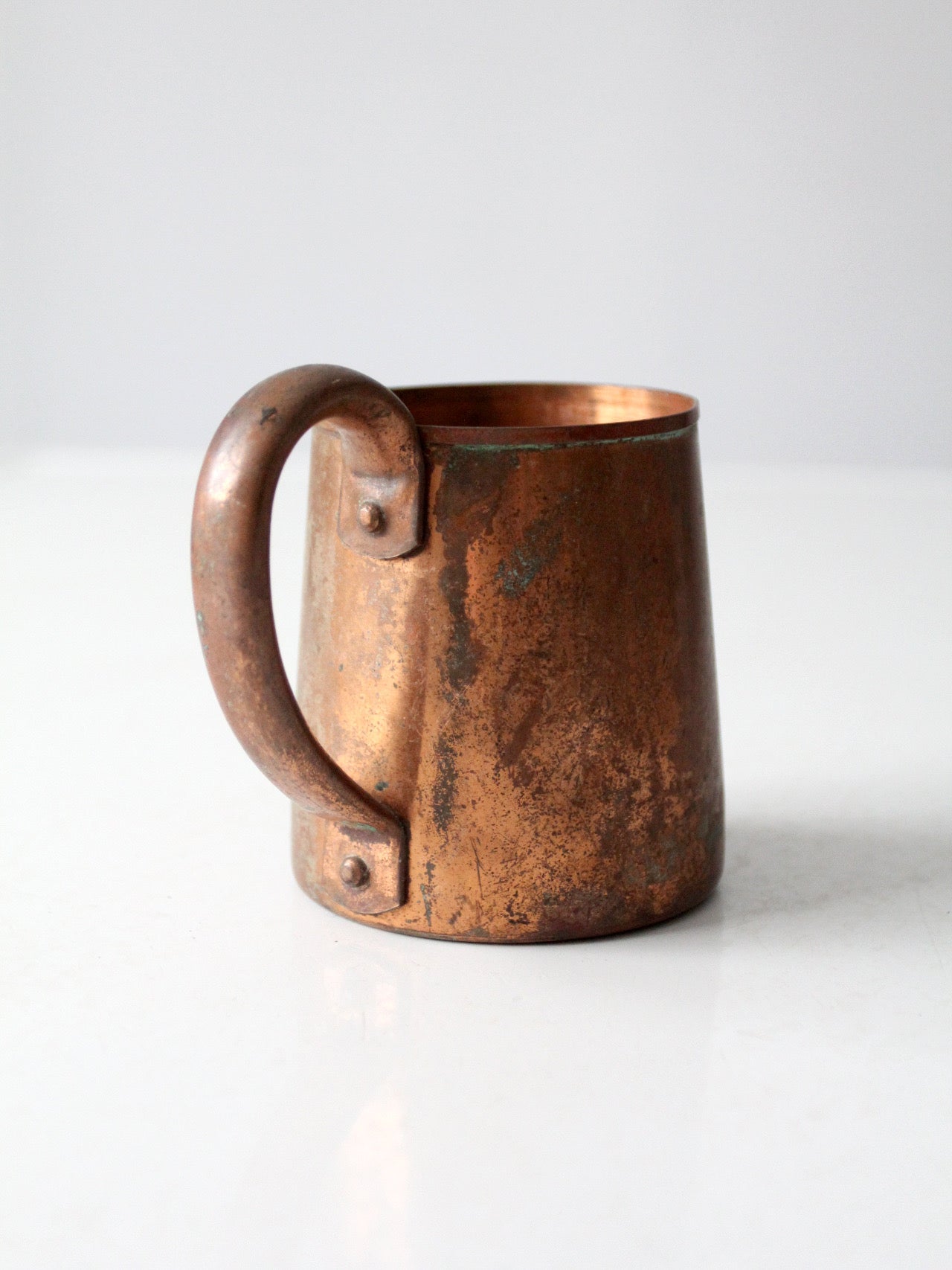 vintage copper mug with riveted handle