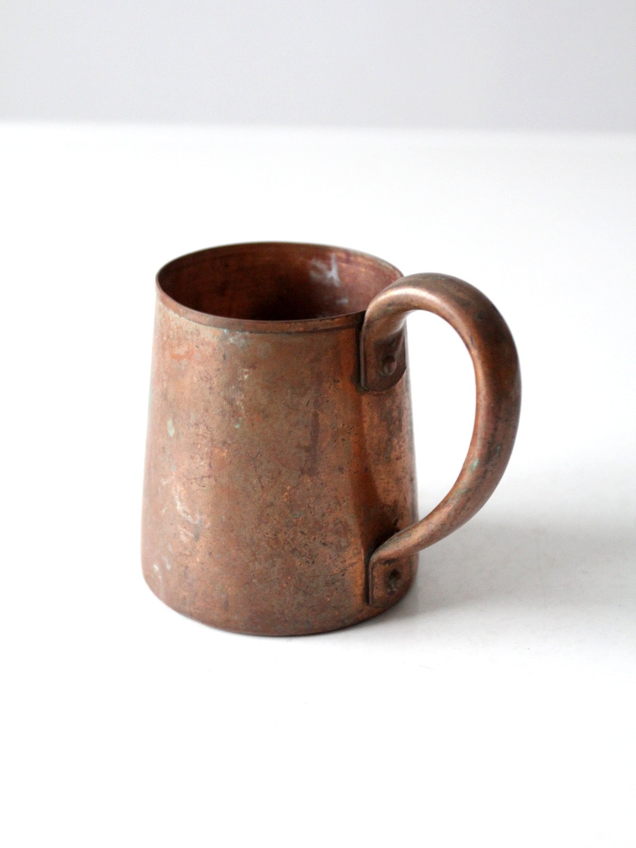 vintage copper mug with riveted handle
