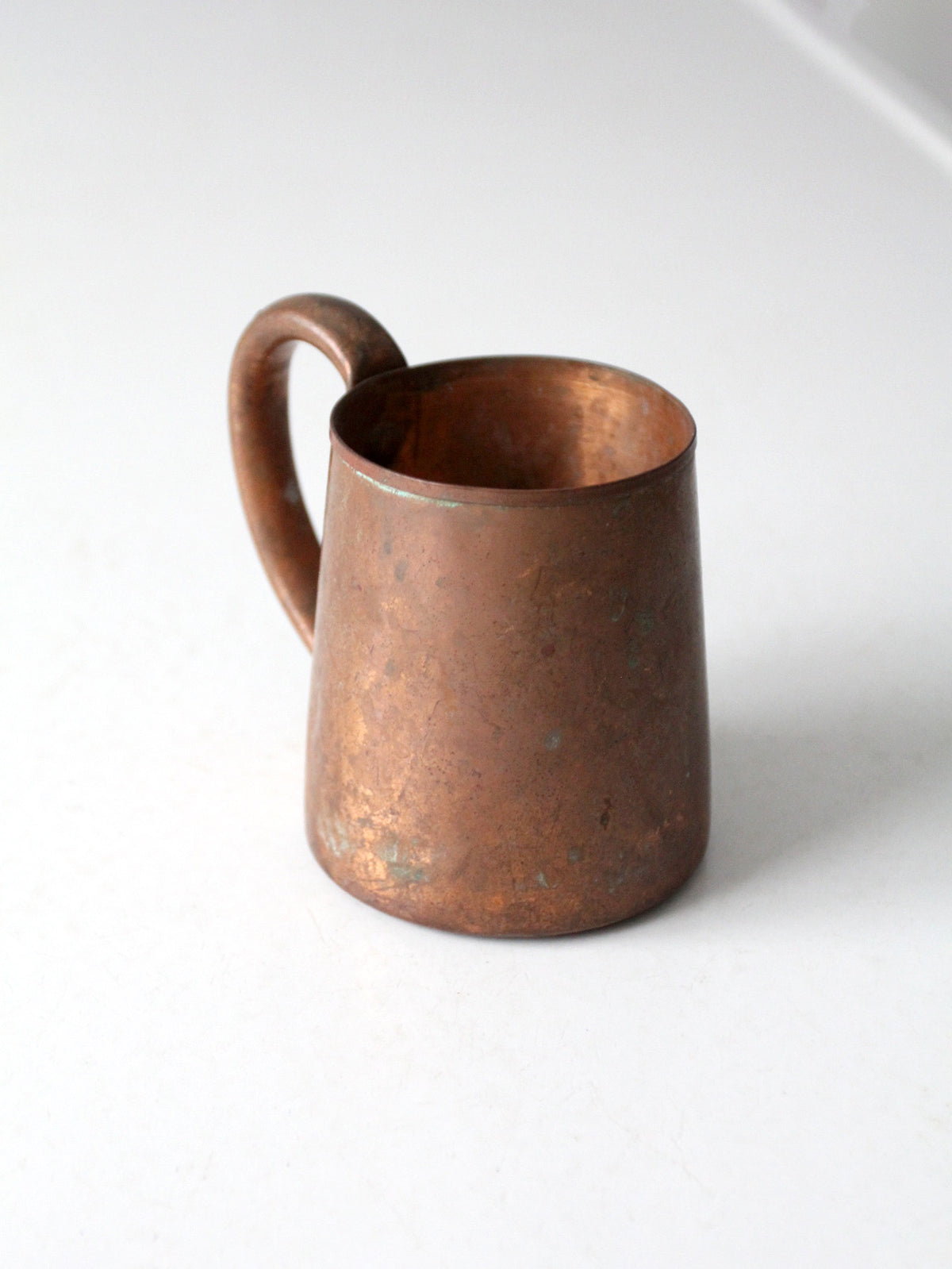 vintage copper mug with riveted handle