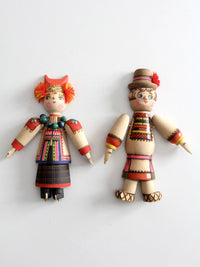 mid-century Scandinavian folk art wall hangings pair